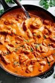 A super easy, full flavoured Butter Chicken recipe that rivals any restaurant. Aromatic golden chicken pieces in an incredible curry sauce. | cafedelites.com